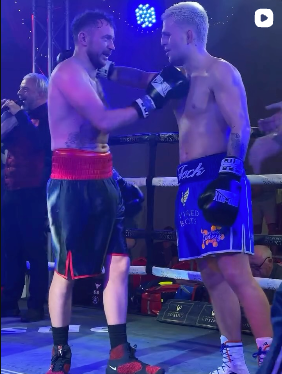 Fighters embrace after a bout